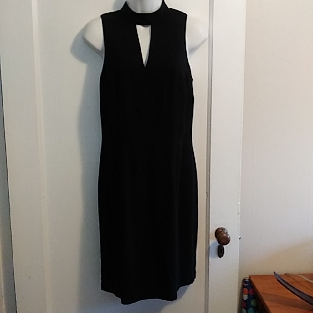 Dawn Joy Black fully lined cocktail dress. Size 5/6.